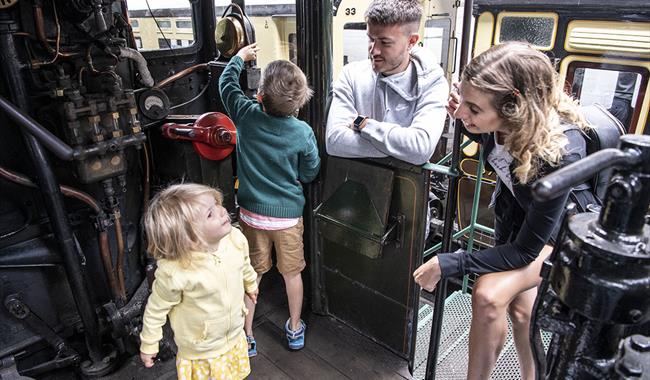 Family onboard an engine at Didcot Railway Centre